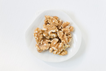 Walnut on shellfish shape dish