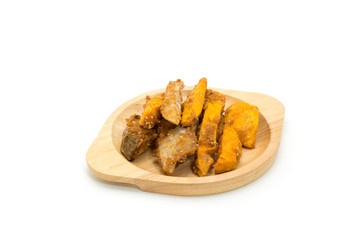 Fried banana fritters on with wood plate white background