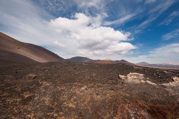 Naklejka premium Amazing volcanic landscape and lava desert in Timanfaya national park, Lanzarote, canary islands, Spain.