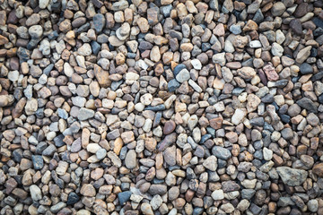 Stone pebbles texture background for interior exterior decoration and industrial construction concept design.