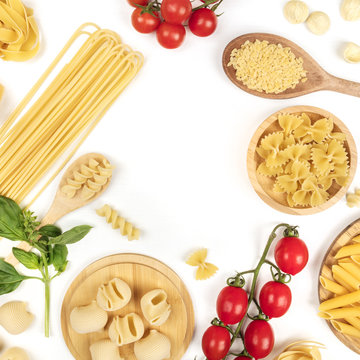 Overhead square photo of different types of pasta on white, forming frame