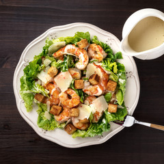 Overhead photo of shrimp Caesar salad, square photo