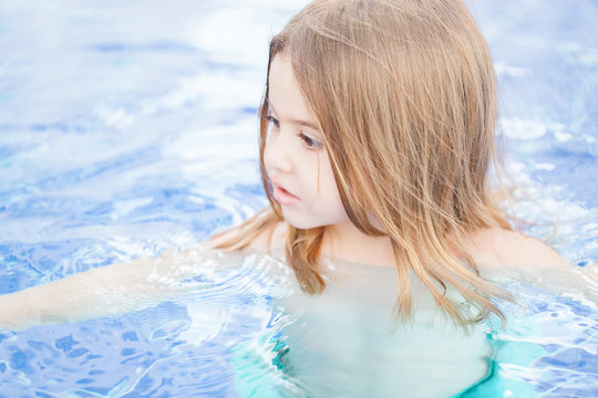 Little, Pretty Girl In A Swimming Pool 