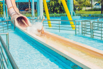 Man having fun at water park.