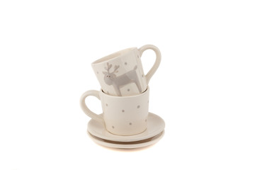 Beige ceramic cups for coffee or tea, white background