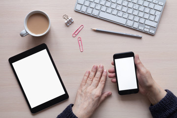 Wood office desk with stationery