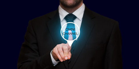 The concept of Omnichannel with businessman on black background