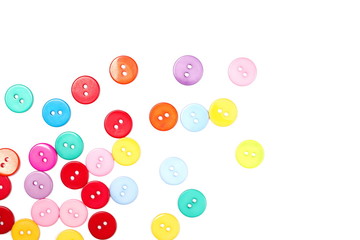 Colorful sewing buttons isolated on white background, top view