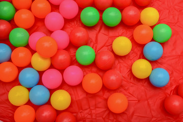 Colorful plastic balls at the playground. Colorful background