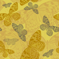 Seamless abstract art pattern of tropical butterflies Idea Leuconoe  in yellow tones