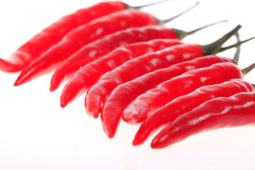 Red hot chili peppers isolated on white background