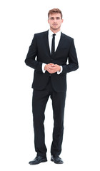 portrait in full length of serious young businessman.