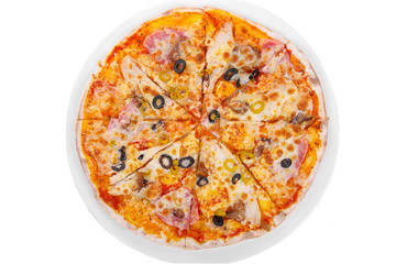 Pizza whole round, cut into pieces, on a white isolated background. Fast food in a pizzeria, a floury cheese product. View from above