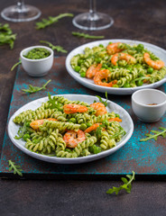 Plates with green pasta