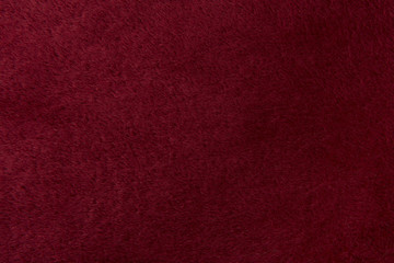 Full-frame burgundy red velvet cloth background