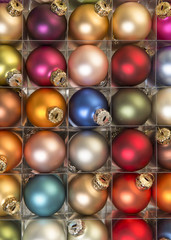Christmas balls in different colors seen from above