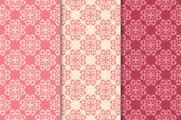 Set of red floral ornaments. Cherry pink vertical seamless patterns