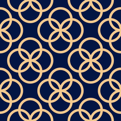 Golden geometric ornament on blue background. Seamless pattern