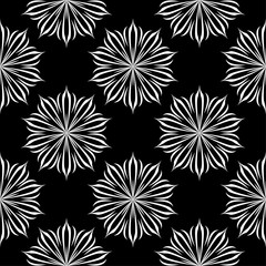 White floral design on black background. Seamless pattern
