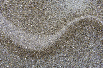 abstract line pattern on sand beach