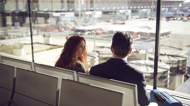 Couple in lounge area of airport