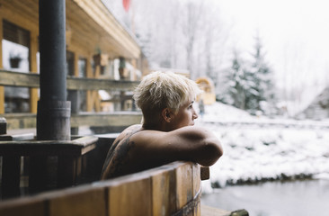 Woman relaxing in hot spring