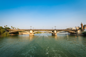 Fototapeta na wymiar Triana bridge in Seville, Spain.