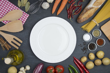 Food and cooking concept. Organic Ingredients, plate top view and copy space.