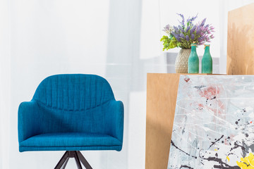 Blue modern chair in modern light room