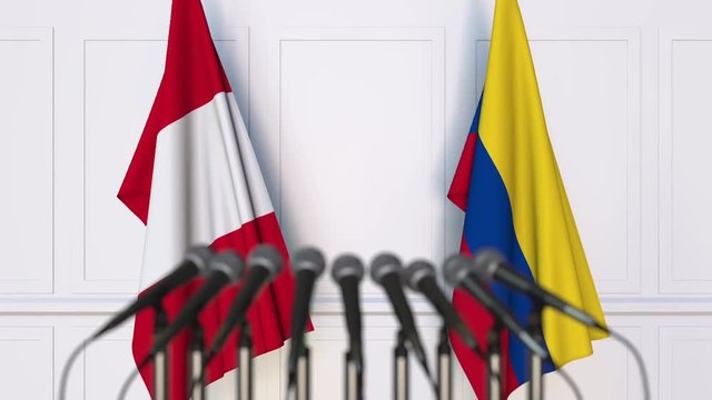 Flags of Peru and Colombia at international meeting or negotiations press conference
