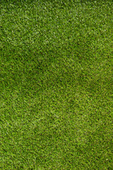 Obraz na płótnie Canvas above top view of an artificial green grass meadow lawn turf synthetic floor