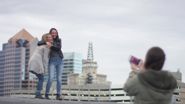 Rebel Girls Pose And Dance On Edge Of Rooftop For Photos - Shot On Red Scarlet-W Dragon In 4K/ Slow Motion