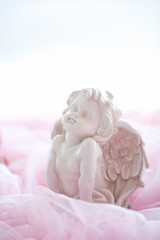 Fototapeta na wymiar Dolls of Love.Cupid doll that express love.