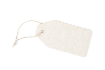 Blank paper label or cloth tag on the white
