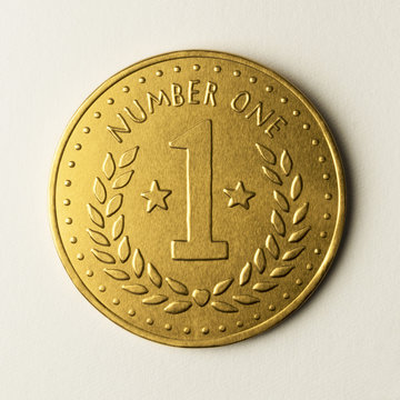 Gold number one medal coin, metal chocolate currency, for a first class friend, family, mother, father, sister, brother, partner, spouse winner