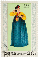 Woman in traditional Korean dress for autumn
