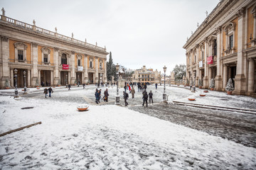 Obraz premium A lovely day of snow in Rome, Italy, 26th February 2018: a beautiful view of Colosseum under the snow