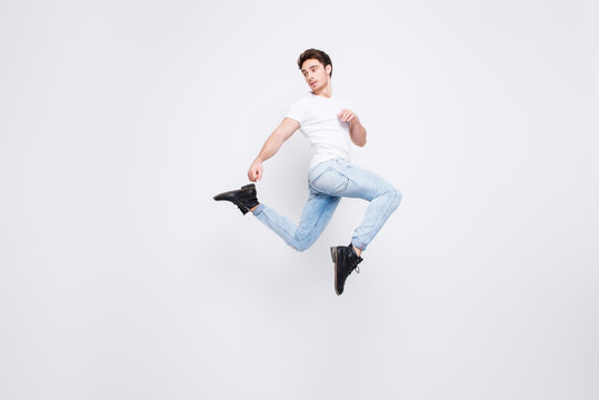 Success fancy chic classy vogue people person rest relax concept. Full-size full-length profile side view portrait of carefree handsome attractive guy jumping up isolated on gray background copy-space