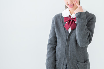 あっかんべーをする制服を着た女の子