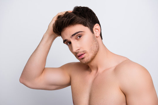 Groomed pamper virile hazel eyes people person remedy moisturizing concept. Close up portrait of handsome confident attractive muscular naked nude guy fixing touching haircut isolated gray background