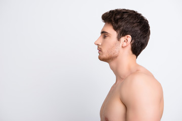 Half-faced profile side view portrait of confident sexy sporty modern guy with   perfect smooth...