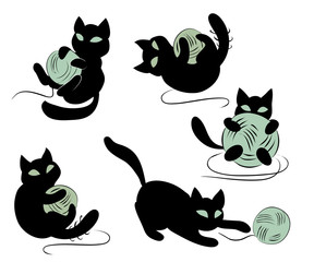 Set of funny black kittens playing with clews.