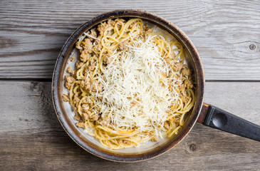 Fresh pasta with meat and cheese. Selective focus.