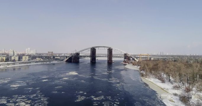 Rusty unfinished bridge in Kiev, Ukraine. Combined car and subway bridge under construction.