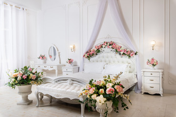 Luxury bright bedroom interior