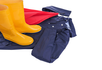 Raincoat and umbrella and rubber boots on a white background.