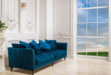 Luxury white living room with panoramic window