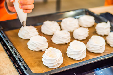 Making tasty meringues with pastry bag