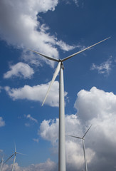 wind turbine on blue sky with Cloud