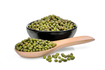 mung beans in wooden spoon and black bowl isolated on white background